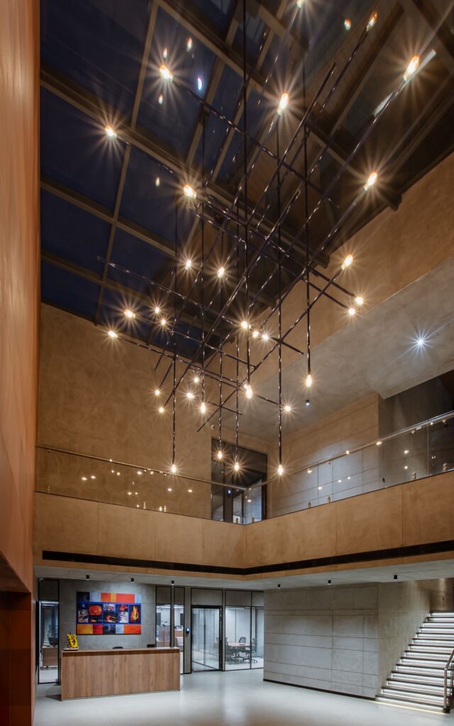 Modern atrium interior reflecting overall facade material selection and architectural finishes.
